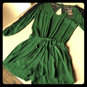 Beautiful Ella Moss Romper with lace detail